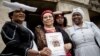 Esther Utjiua Muinjangue, présidente de la Fondation du génocide d'Ovaherero en Namibie, et les membres de la délégation namibienne, le 27 août 2018.