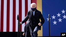 Democratic presidential candidate former Vice President Joe Biden arrives to speak during a campaign event at Riverside High School in Durham, N.C., Oct. 18, 2020.