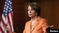 FILE - U.S. House Minority Leader Nancy Pelosi speaks to reporters, Dec. 2012.