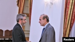FILE - Iran's Deputy Foreign Minister and Chief Nuclear Negotiator Ali Bagheri Kani speaks with Deputy Secretary General of the European External Action Service (EEAS), Enrique Mora, in Tehran, Iran, May 11, 2022. Courtesy WANA
