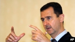 FILE - Syrian President Bashar al-Assad.