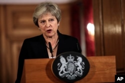 British Prime Minister Theresa May makes a statement on Brexit negotiations with the European Union, at 10 Downing Street, in London, Sept. 21, 2018.