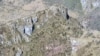 Lokasi jatuhnya helikopter TNI Angkatan Darat yang hilang sejak Juni 2019 lalu dan ditemukan di salah satu tebing di Pegunungan Mandala, Distrik Oksop, Kabupaten Pegunungan Bintang, Papua, Senin (10/2). (Foto Courtesy: Pendam XVII/Cendrawasih, Papua)