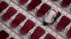 FILE - A man prays at the Cut Meutia Mosque in Jakarta, Indonesia.