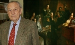 FILE - Bernd Freytag von Loringhoven poses in front of a painting of his ancestors at his home in Munich, Germany, April 29, 2005. Freytag von Loringhoven, who was part of Adolf Hitler's entourage in the final weeks of World War II, died in 2007.