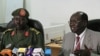FILE - South Sudanese Minister of Information Barnaba Benjamin Marial, right, and Military Spokesman Philip Aguer brief the median Juba, south Sudan about recent fighting between Sudanese and South Sudanese forces along the north-south border.