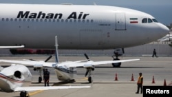 An Airbus A340 airplane of Mahan Air is seen at Simon Bolivar International Airport outside Caracas, Venezuela, April 8, 2019. 