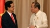 Philippine President Benigno Aquino III, right, shakes hands with Vietnamese Prime Minister Nguyen Tan Dung after their joint press statement at the Malacanang Presidential Palace in Manila, Philippines, May 21, 2014. 