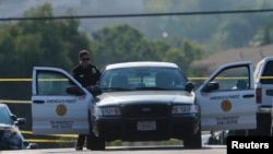 La police de San Diego sur la scène d'un meurtre, à San Diego, Californie, le 29 juillet 2016.