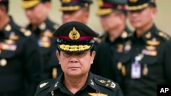 Thai new Prime Minister Prayuth Chan–ocha arrives to attend an establishment anniversary of the 21st Infantry Regiment, Queen's Guard in Chonburi Province ,Thailand, Aug. 21, 2014. 
