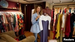 Ksenia Karpenko, a 33-year-old Ukrainian fashion designer from Kyiv, is now working in Spain. She is not sure if she will return. June 23, 2023. (REUTERS/Juan Medina)
