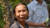 Im Chaem, 68, a former Khmer Rouge regional commander, in a picture with Youk Chhang, executive director of the Documentation Center of Cambodia, in Anlong Veng, February 13, 2012. (Courtesy of Documentation of Cambodia) 