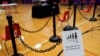 A sign for voters is seen in a polling area ahead of Election Day at the Waterville Junior High School in Waterville, Maine, Nov. 2, 2020.