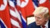 도널드 트럼프 미국 대통령이 지난달 30일 판문점 회동에서 김정은 북한 국무위원장의 발언을 듣고 있다.