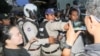 Police clashed with the land dispute community of Boeng Kak lake in Phnom Penh, Cambodia, Monday, August 15, 2016. (Photo: Leng Len/VOA Khmer)