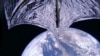 This image was taken during the LightSail 2 sail deployment sequence, July 23, 2019. Baja California and Mexico are visible in the background. LightSail 2's dual 185-degree fisheye lenses can each capture more than half of the sail.