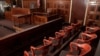FILE -- A view of the jury box (front), where jurors would sit in and look towards the judge's chair (C), the witness stand (R) at the New York Supreme Court.