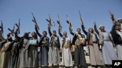 Shi'ite Houthi tribesmen chant slogans during a tribal gathering showing support for the Houthi movement in Sana'a, Yemen, Sept. 21, 2019.