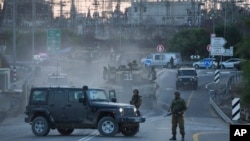 Tanques israelíes se mueven cerca de la frontera israelí con Gaza, Israel, el 11 de octubre de 2023.