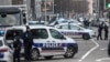 French police forces block a street during an operation in the Neudorf district of Strasbourg, eastern France, Thursday, Dec. 13, 2018.