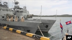 Cambodian navy troop members stand on a navy boat at Ream Naval Base in Sihanoukville, southwestern of Phnom Penh, Cambodia on July 26, 2019. Cambodia's government on Monday, Oct. 5, 2020, officially denied suggestions that its demolition of a U.S.-funded