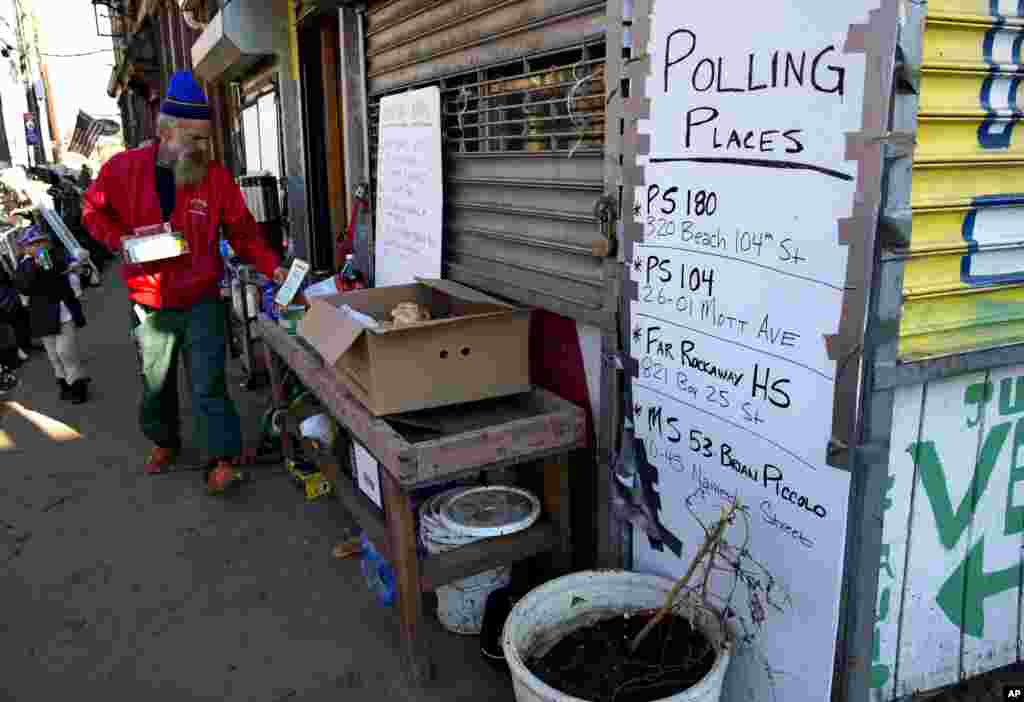 A sign erected by a community group called Rebuild Rockaway shows voting locations in the Rockaway neighborhoods in Queens, New York.