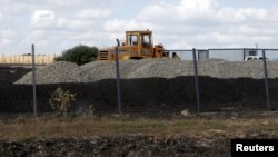 An excavator is seen at a construction site for Russia's new military base near the Russian-Ukrainian border in the village of Soloti, southeast of Belgorod, Russia, September 7, 2015.