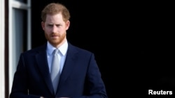 Pangeran Harry menghadiri acara rugby di taman Istana Buckingham di London, Inggris,16 Januari 2020. (Foto: REUTERS/Toby Melville)