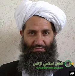 FILE - In this undated photo taken at an unknown location, the leader of the Taliban, Mullah Haibatullah Akhundzada, poses for a portrait.
