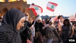 Every day for more than a month, demonstrators have been in the streets expressing their anger and celebrating what they call their ‘revolution’ in Beirut, Lebanon, Nov. 17, 2019.