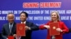 Britain's International Trade Secretary Liz Truss and Vietnam's Minister of Industry and Trade Tran Tuan Anh at a Hanoi signing ceremony of a free trade deal, Dec11, 2020. 
