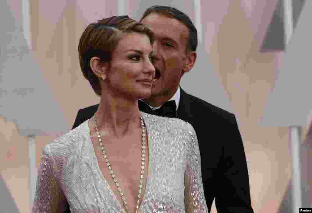 Tim McGraw aux cotés de sa femme Faith Hill aux 87e Oscars à Hollywood, California, le 22 février 2015.