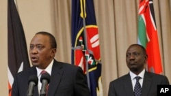 Rais Uhuru Kenyatta (kushoto) na Makamu wa Rais William 