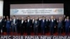 Leaders pose for a family photo at the APEC 2018 Economic Leaders Meeting at the APEC Haus at Port Moresby, Papua New Guinea, Nov. 18, 2018.