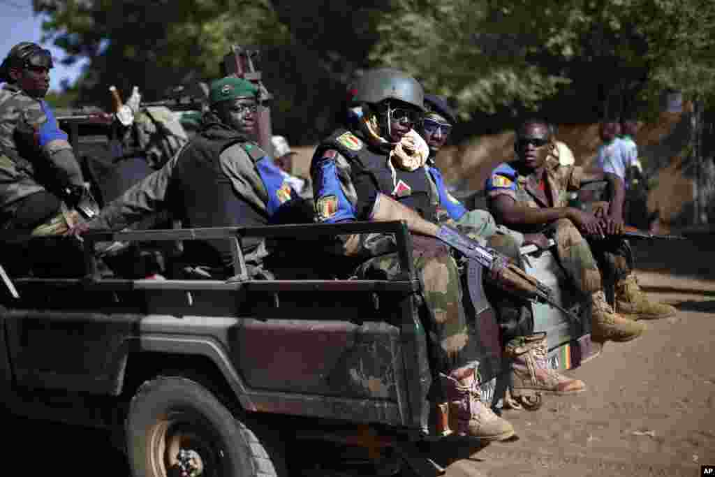 Soldiers patrol the streets of Gao, Northern Mali, Nov. 24, 2013.