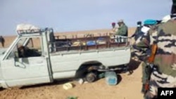 Hoton daya daga cikin motocin a-kori-kura da suka lalace har mutane 92 suka mutu a cikin hamadar arewacin Nijar.