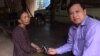 Im Chaem, the former Khmer Rouge secretary of Preah Net Preah district, with VOA Khmer's reporter Sok Khemara in her home, in Oddor Meanchey, on August 11, 2015. (Photo: VOA Khmer) 