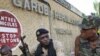 Troops from the Republican Forces of Ivory Coast guard a base in Ivory Coast's main city, Abidjan, April 18, 2011. 