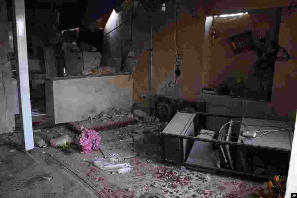 A house in ruins in Varzaqan after the earthquake hit, August 11, 2012.
