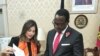 Malawi's President Lazarus Chakwera (right) is presented with a letter of protest by Palestinian envoy Hanan Jarrar in the capital Lilongwe, Nov. 5, 2020. (Photo courtesy of Malawi Insititute of Journalism)