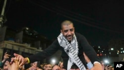 30 Ocak 2025 - El Fetih partisinin silahlı bir kolu olan El Aksa Şehitleri Tugayı'nın eski lideri Zekeriya Zübeydi, Batı Şeria'nın Ramallah kentindeki İsrail hapishanesinden serbest bırakıldıktan sonra Filistinliler tarafından karşılandı.