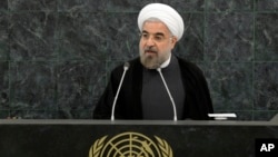 File - Iranian President Hassan Rouhani addresses a high-level meeting on Nuclear Disarmament during the 68th United Nations General Assembly, Sept. 26, 2013. 