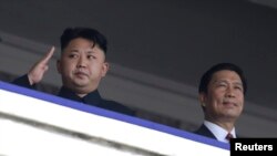 金正恩与中国副主席李源潮2013年6月在朝鲜纪念停战60周年的仪式上
