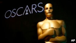 FILE - An Oscar statue appears at the 91st Academy Awards Nominees Luncheon in Beverly Hills, Calif., Feb. 4, 2019.