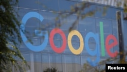 FILE - A Google logo is seen at the tech giant's offices in Mountain View, California, Nov. 1, 2018. 