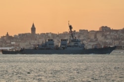 FILE - U.S. Navy guided-missile destroyer USS Porter sails in the Bosphorus, on its way to the Black Sea, in Istanbul, Turkey, Jan. 28, 2021.