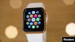 A gold plated Apple Watch is seen at an Apple Store in Berlin, April 10, 2015. 