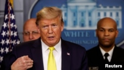 Presiden AS Donald Trump berbicara di Gedung Putih, Senin (9/3). 