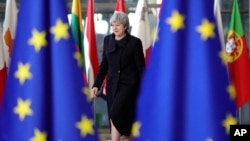 British Prime Minister Theresa May arrives for an EU summit at the Europa building in Brussels, Dec. 14, 2017. 