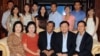Ousted Thai Prime Minister Thaksin Shinawatra (front 2nd R), former Thai Prime Minister Somchai Wongsawat (front R) and Cambodian Prime Minister Hun Sen (front C) pose with Hun Sen's extended family during their meeting at the latter's house in Phnom Penh November 10, 2009. 